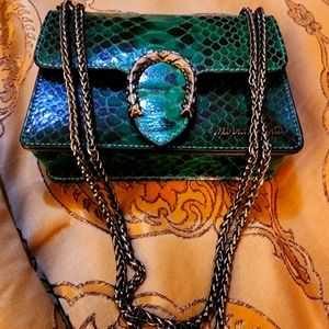 A green Italian leather handbag crossbody  or satchel